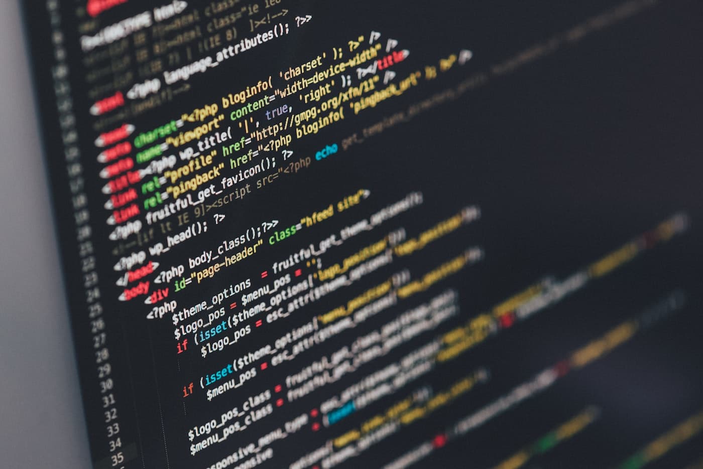 Charts and code side by side on a desk